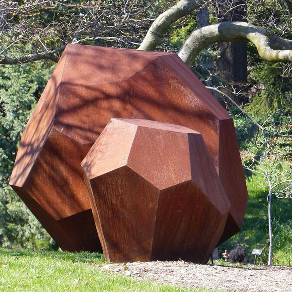 large stone shaped garden corten steel sculpture